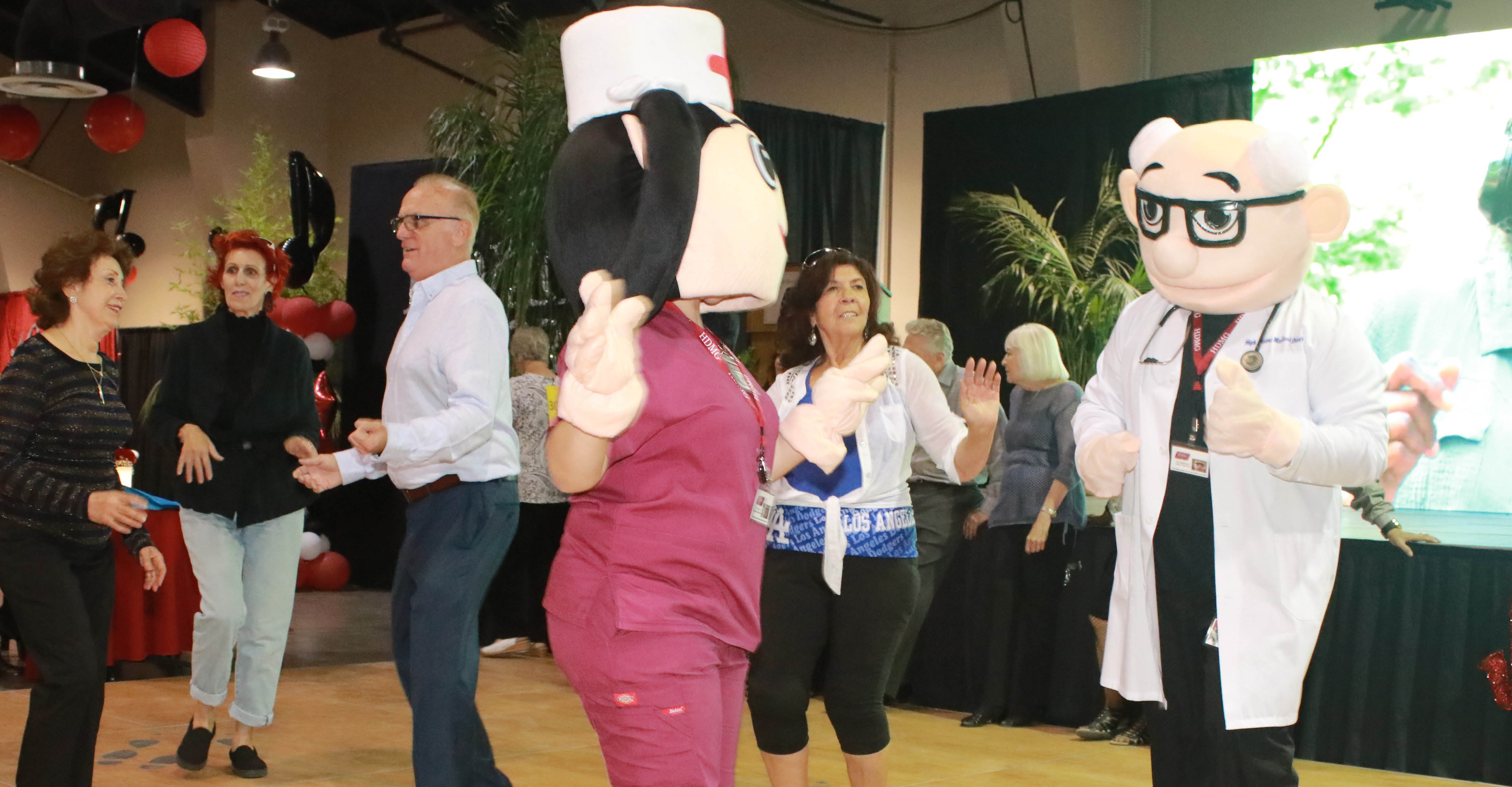 Dr. and Nurse Mascotts Dancing
