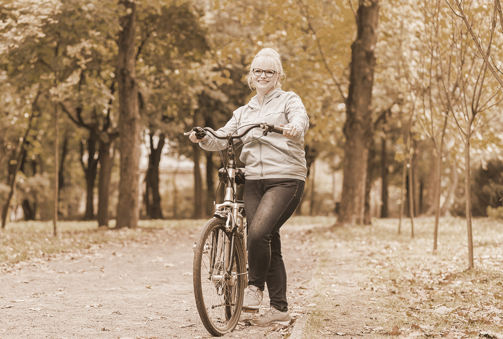 Senior on bicycle exercising